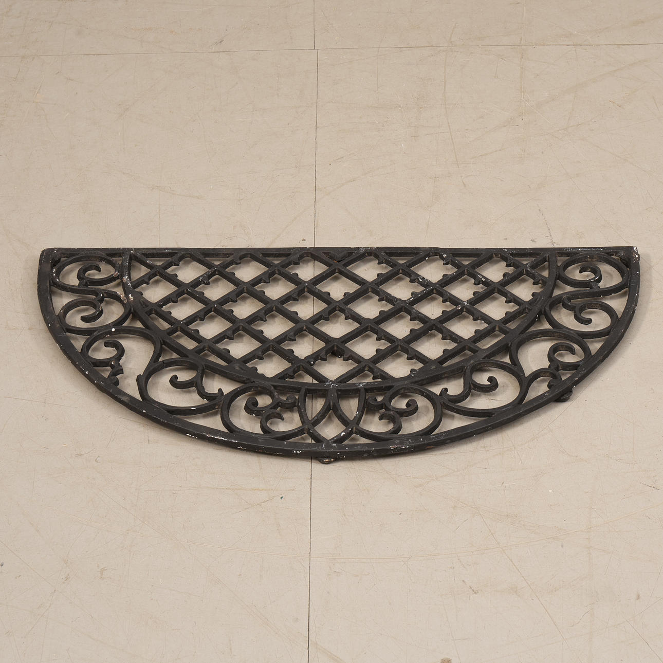 FOOT SCRAPER. Door mat, cast iron.