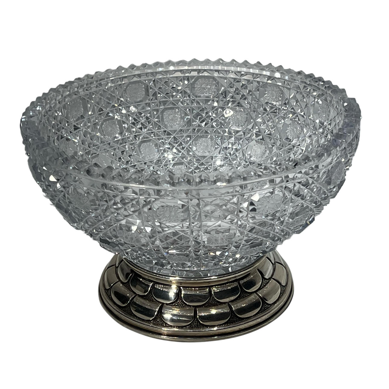 Glass center with silver base.