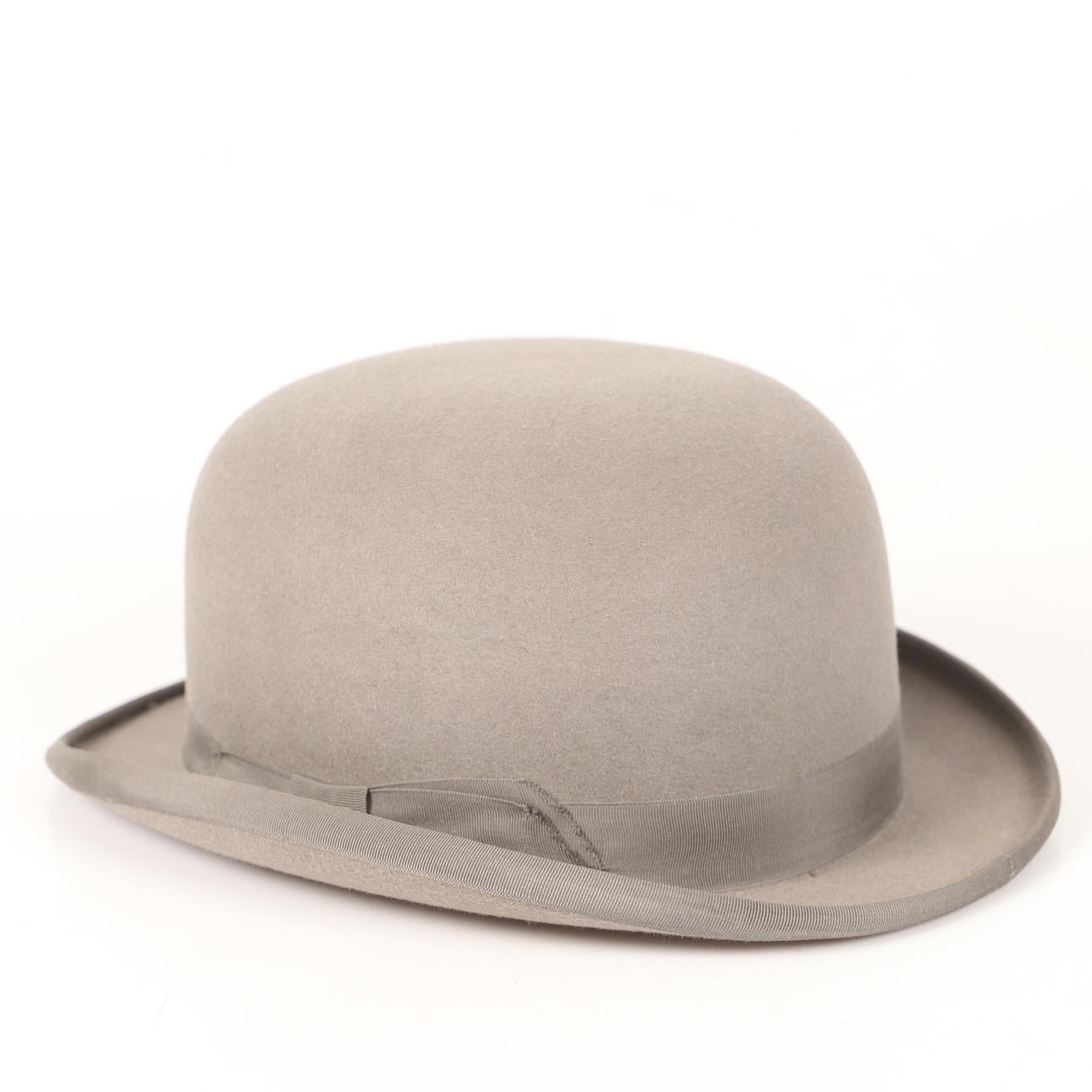 PLOMMONSTOP, grå filt, Christys, London.