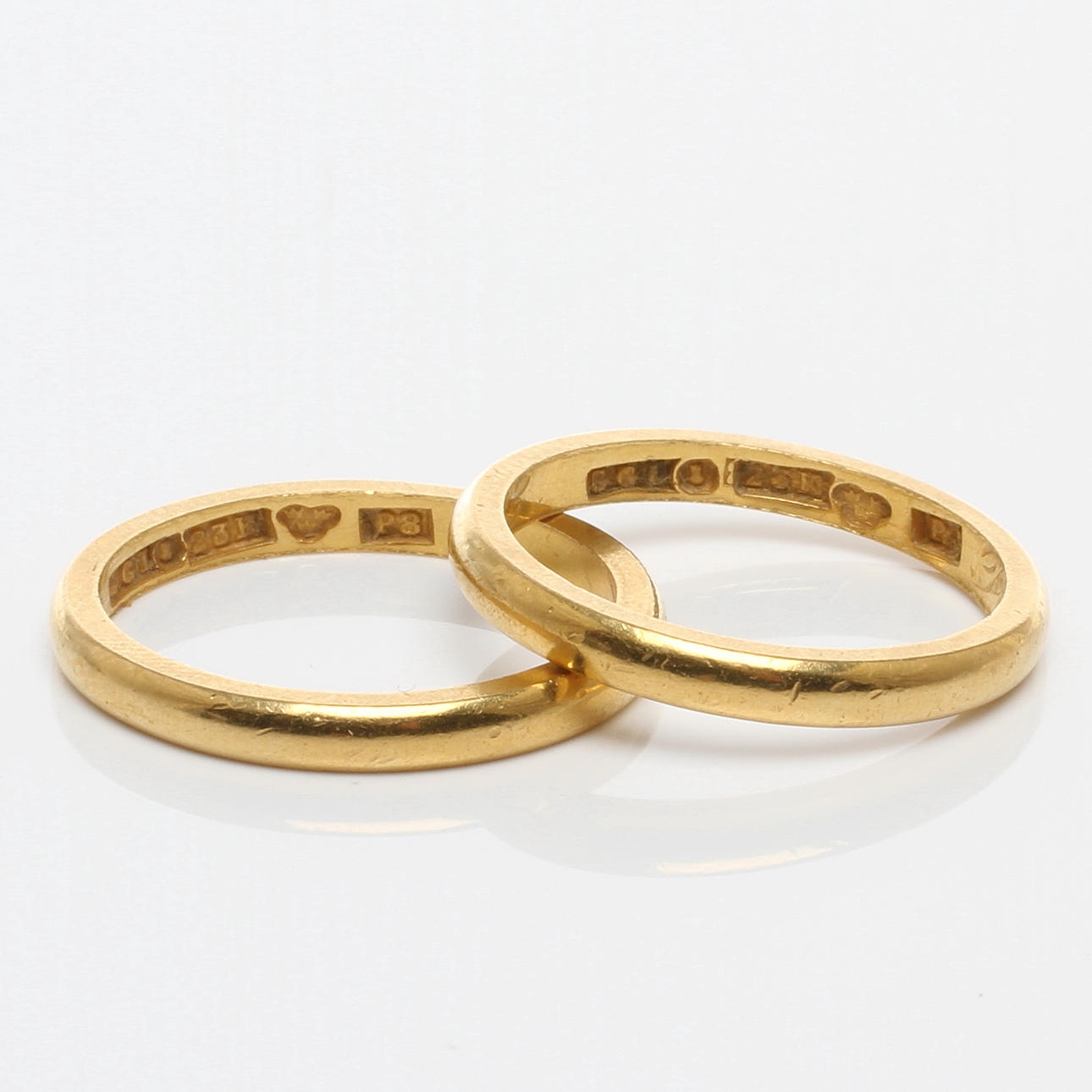 RINGAR 2 st, 23k guld, Stockholm, Gravör Och Guldsmed Axe Lindqvist, 1941.