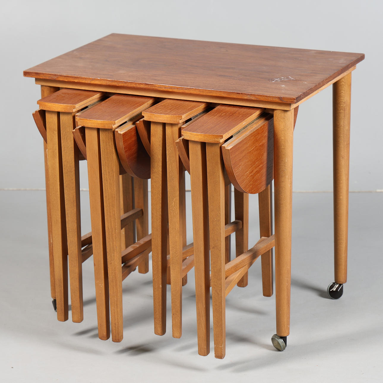 POUL HUNDEVAD (1917-2011). TEAK NESTING TABLES.