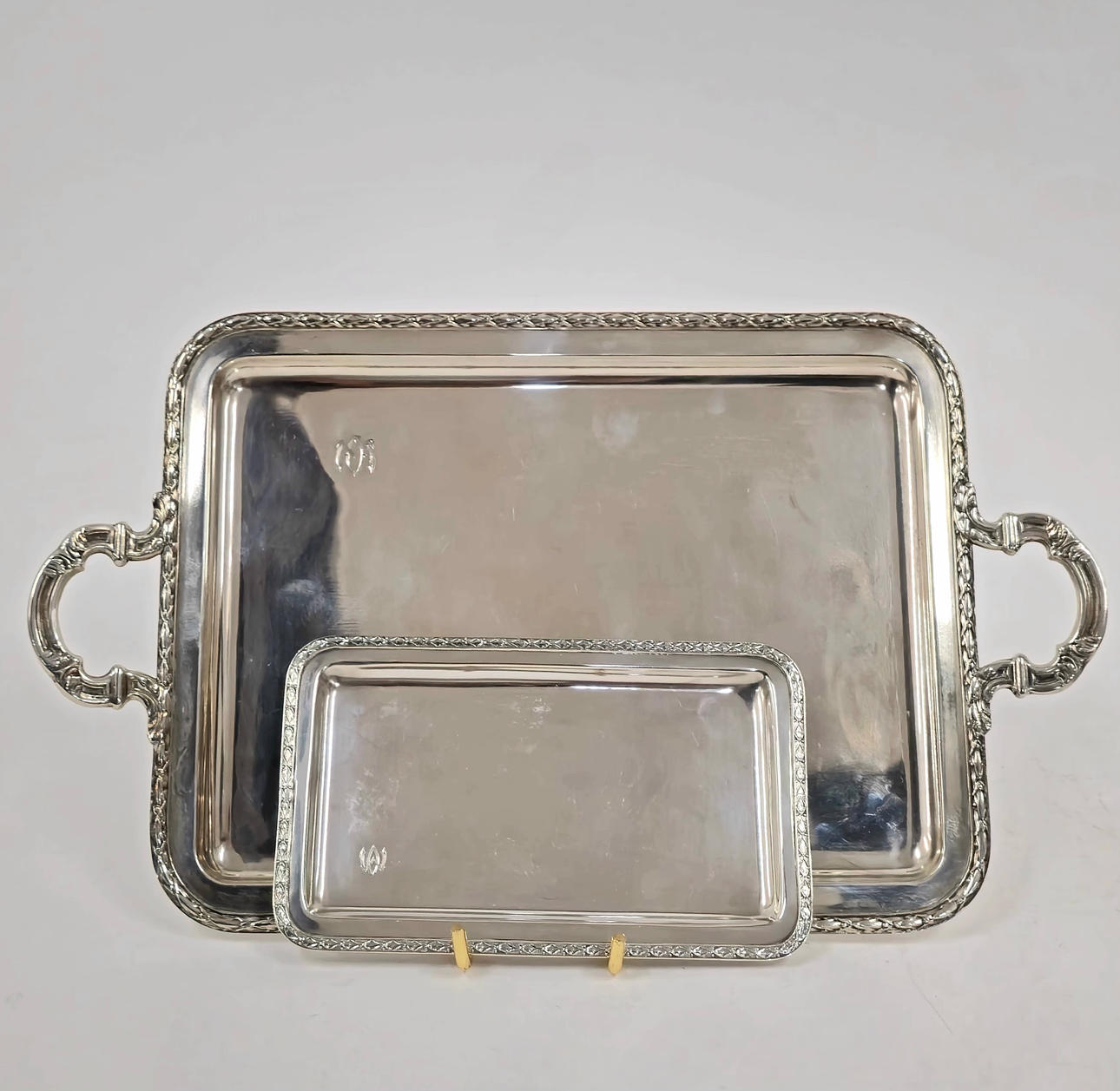 TWO ELIZABETHAN SILVER TRAYS WITH ANAGRAM.