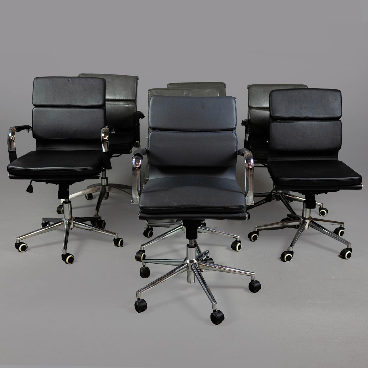 AFTER CHARLES AND RAY EAMES ALUMINIUM GROUP STYLE CHAIRS, A SET OF 7, DIFFERING.