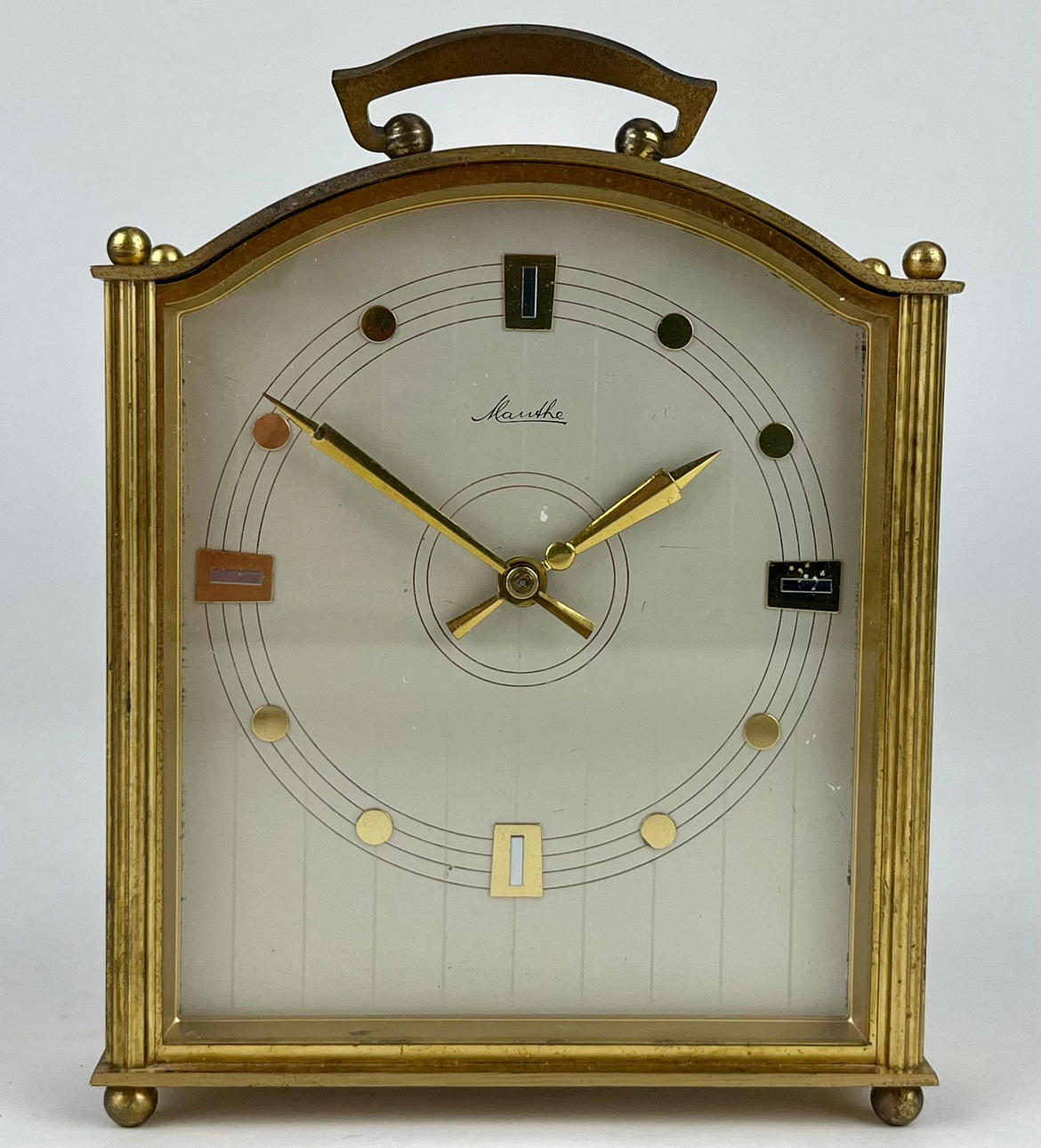 A brass table clock, Mauthe, Germany.