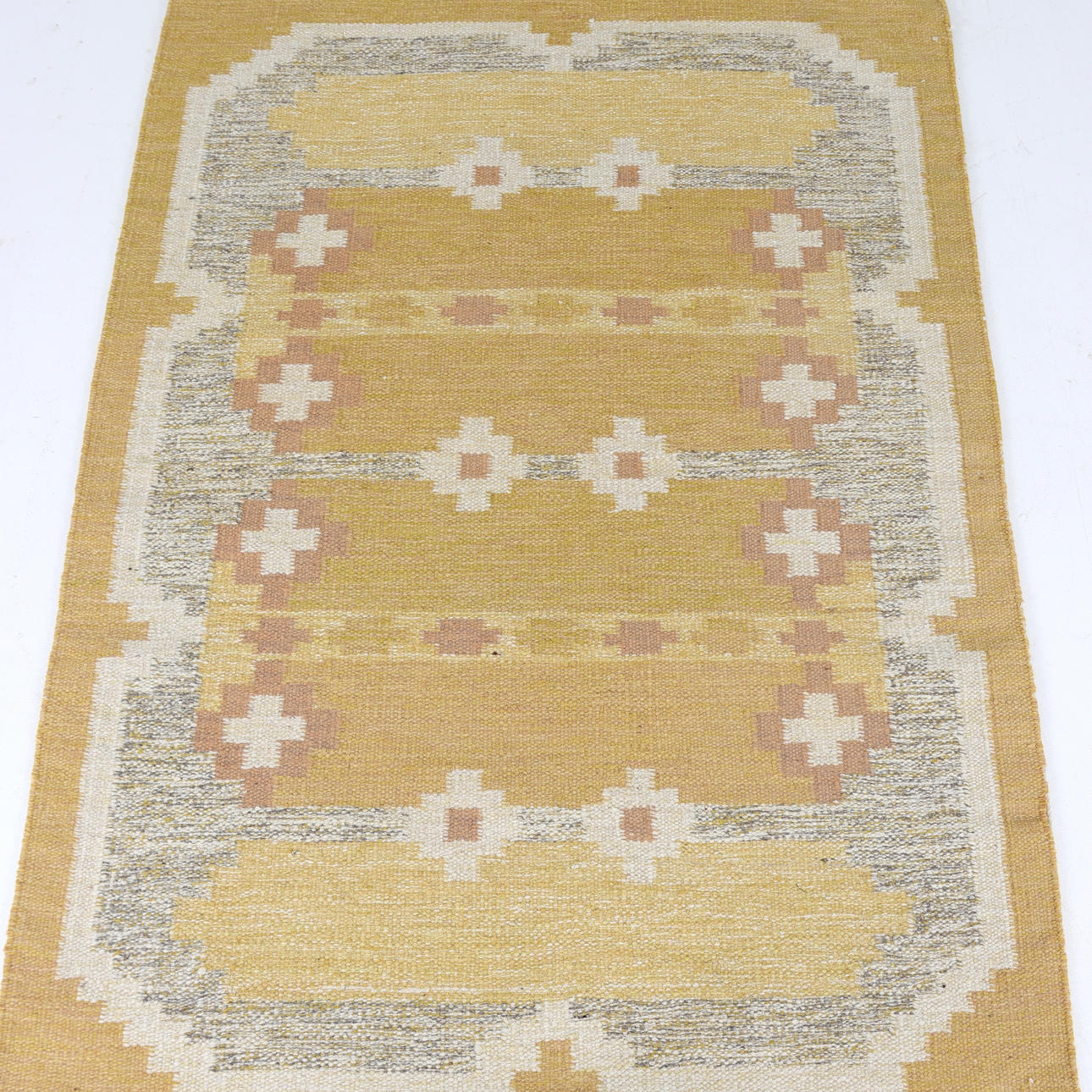 KARIN JÖNSSON. A carpet, wicker, signed JK. 190 x 140 cm.