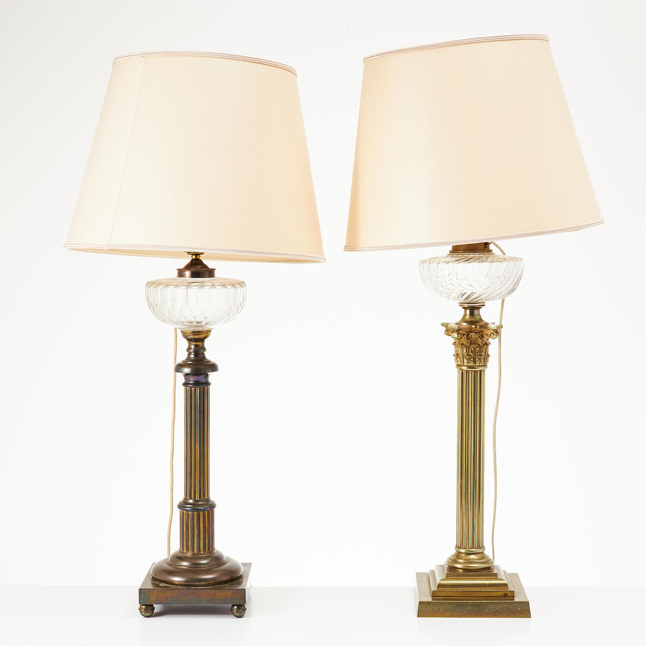 TABLE LAMPS, reworked from kerosene lamps, decoration in the form of columns, brass and cut glass, circa 1900.