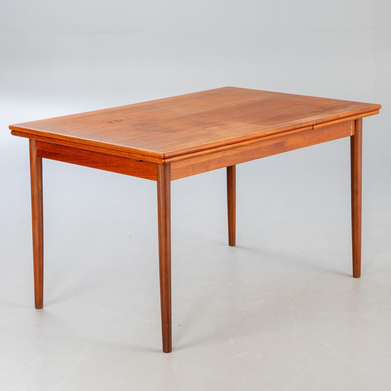 Extendable dining table, teak wood, Denmark, 1960s.