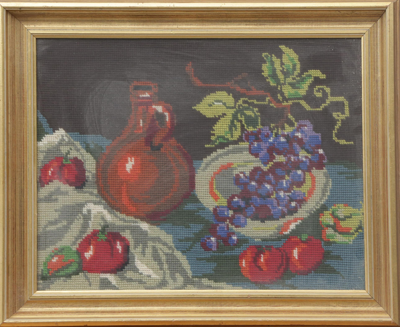 EMBROIDERED STILL LIFE MOTIF.
