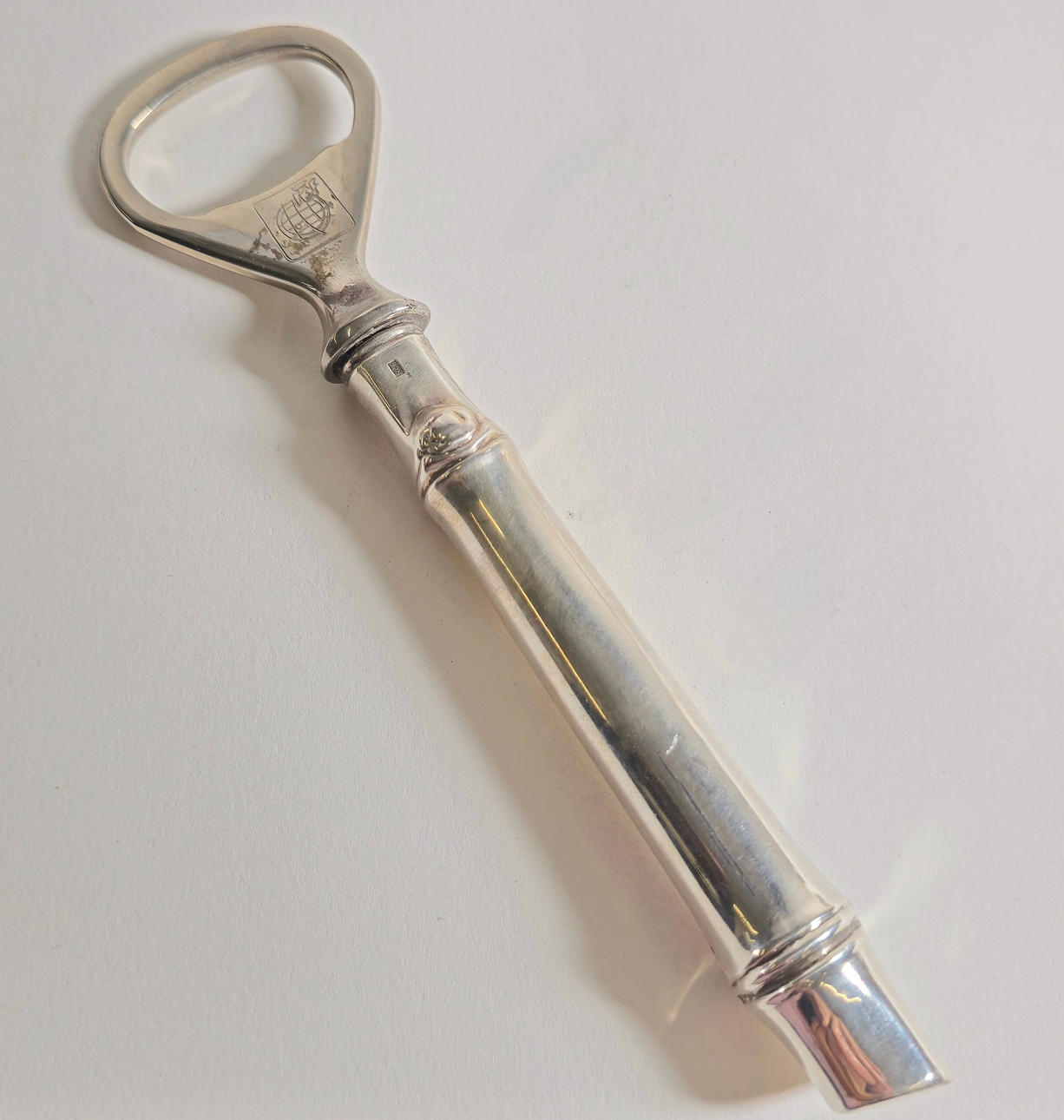 OPEN BOTTLES IN PUNCHED SILVER.