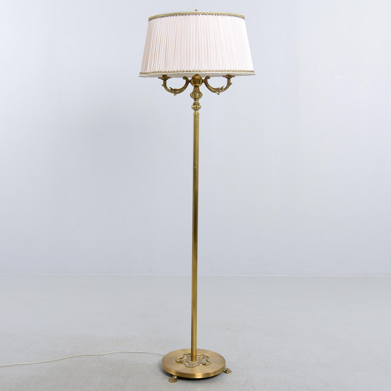 A brass floor lamp, AH Illumination, second part of the 20th century.