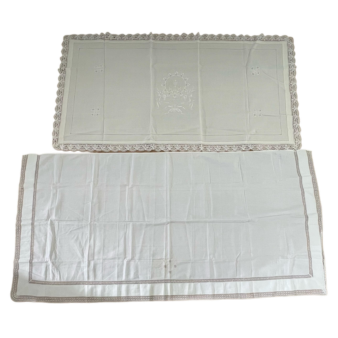 Two altar cloths in embroidered thread.