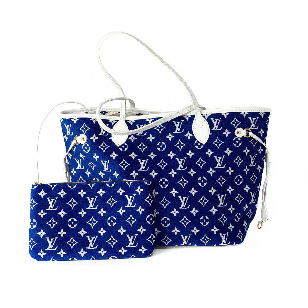 LOUIS VUITTON. Väska, "Neverfull MM Match Bleu", textil samt läder.