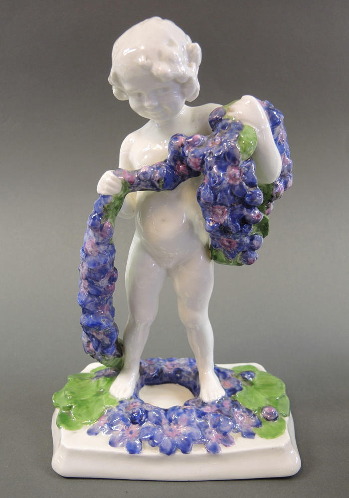 RÖRSTRAND FLICKA MED BLOMSTERKRANS.