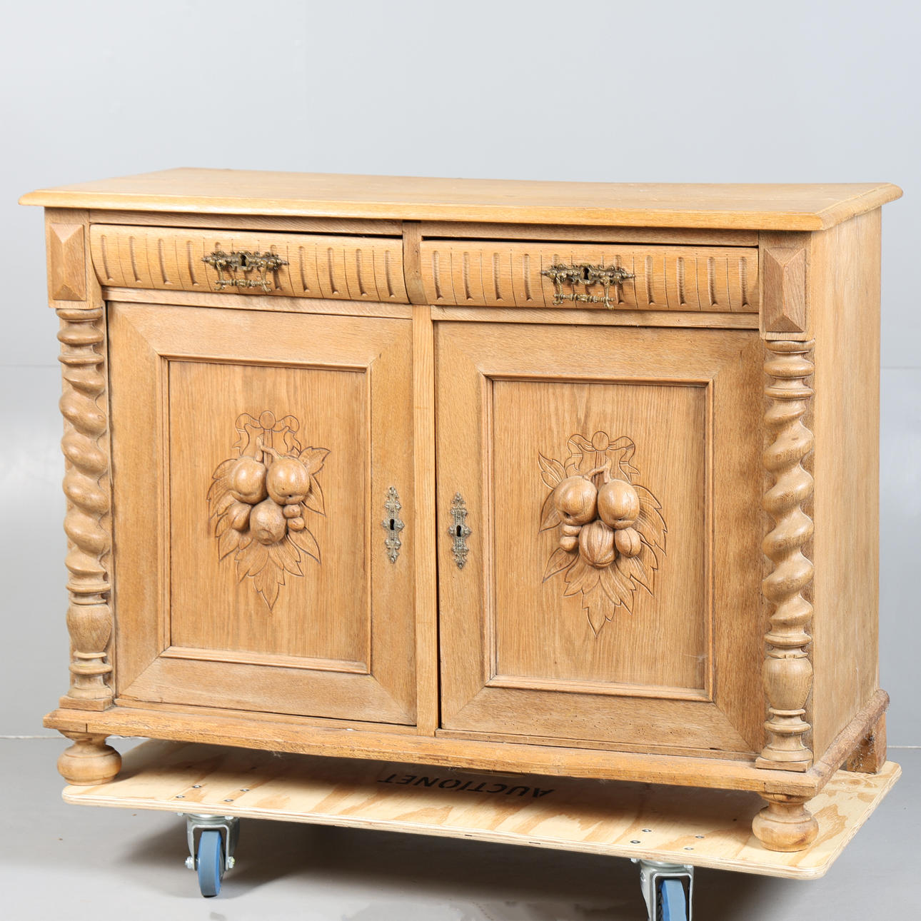 A VICTORIAN OAK DRESSER BASE.