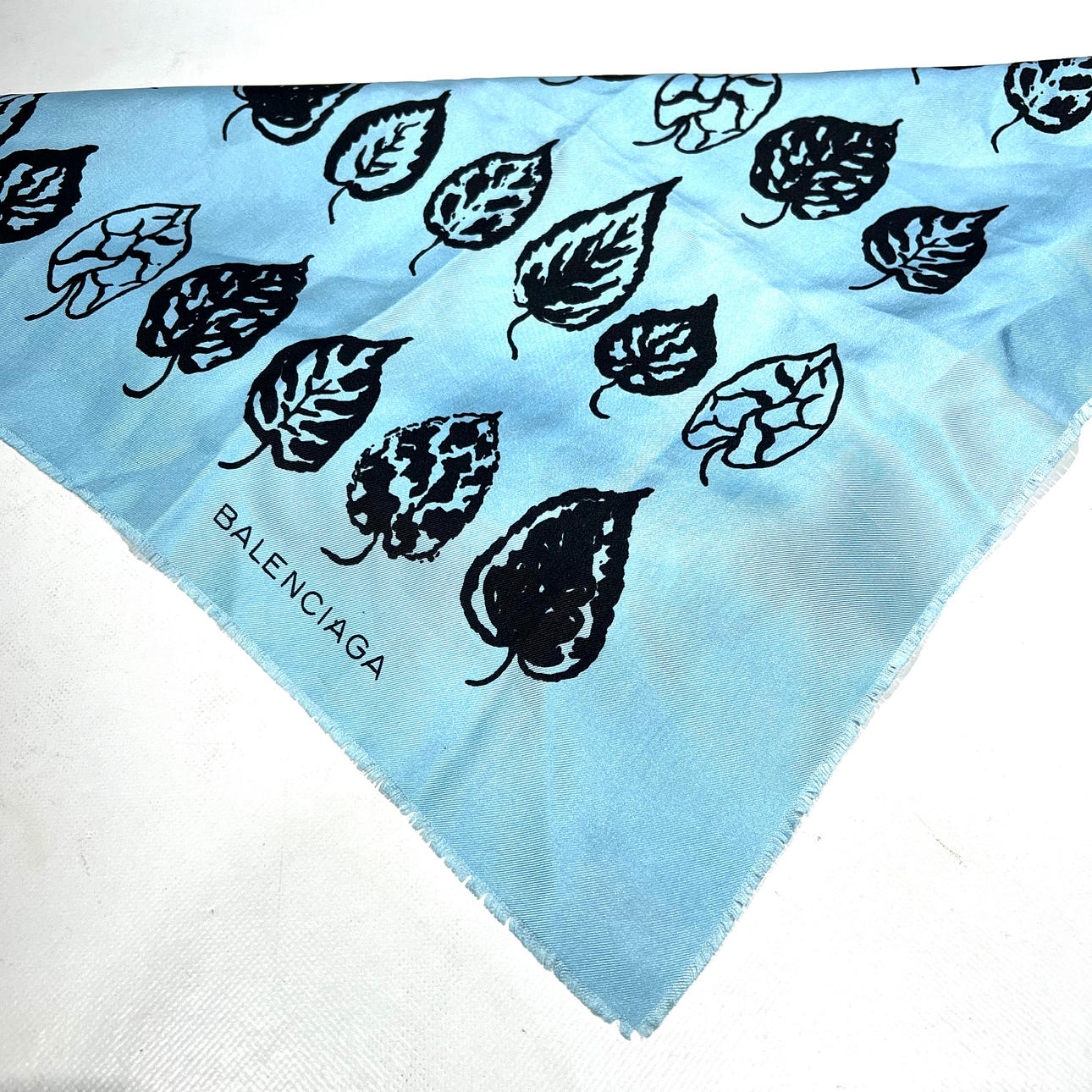 BALENCIAGA. Silk scarf with leaf motif.