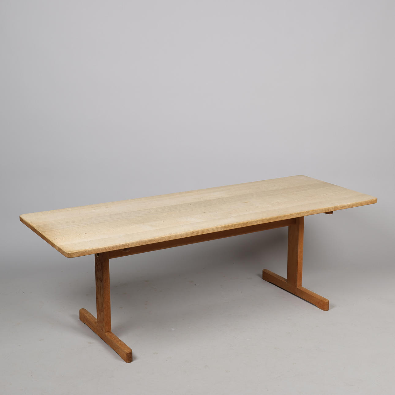 BØRGE MOGENSEN. Børge Mogensen. Coffee table made of solid oak, rectangular plate on shaker steel. Denmark.