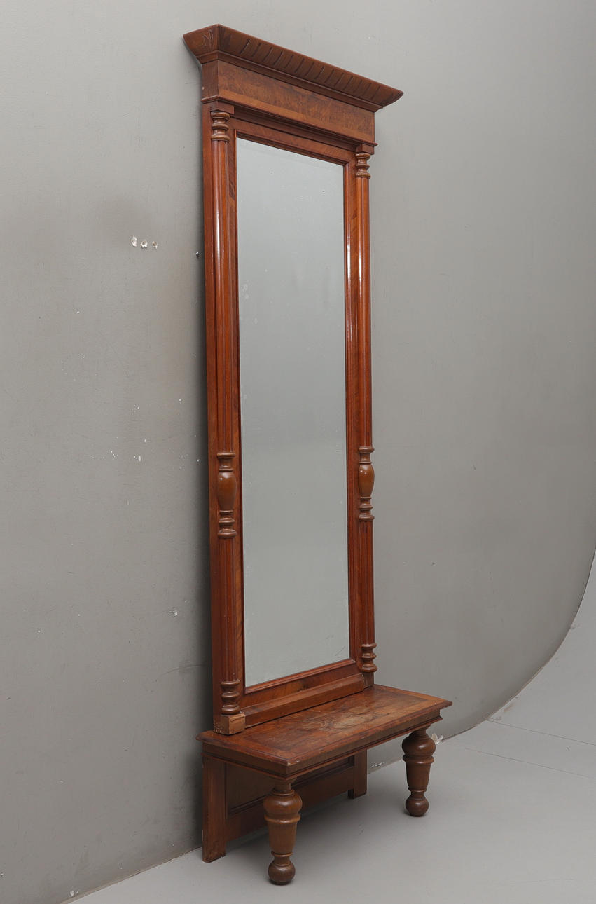 A Neo-Renaissance mirror with console table, later part of the 19th century.
