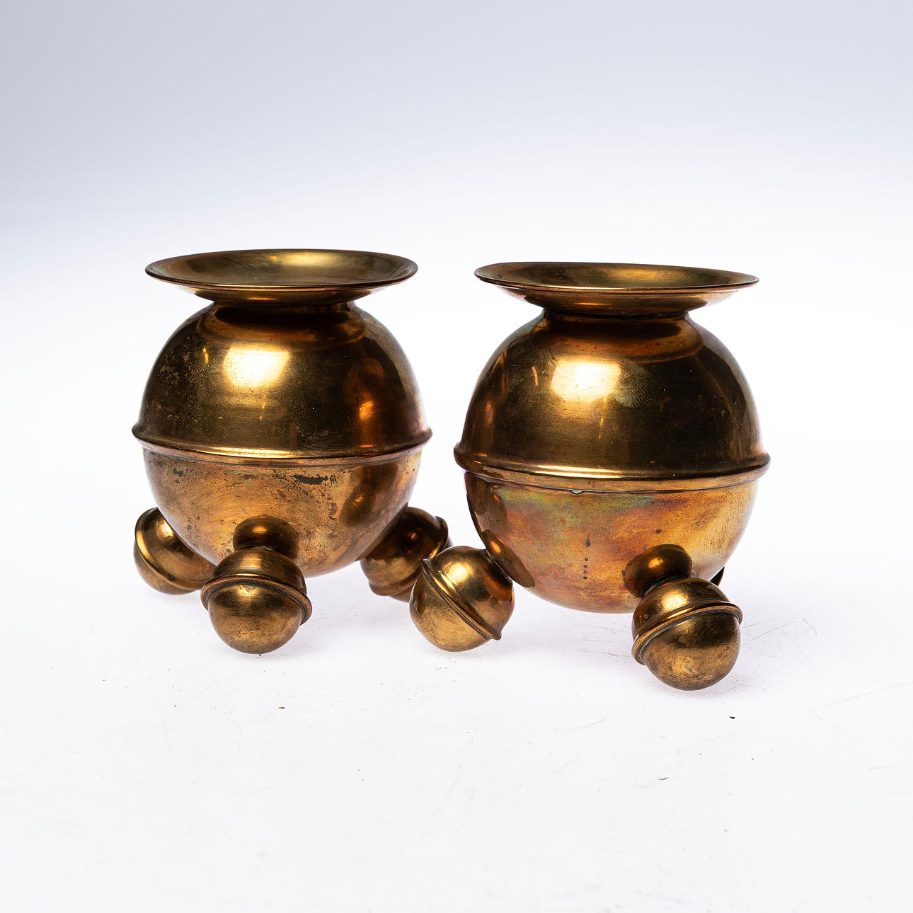 A PAIR OF BALL CANDLESTICKS, brass.