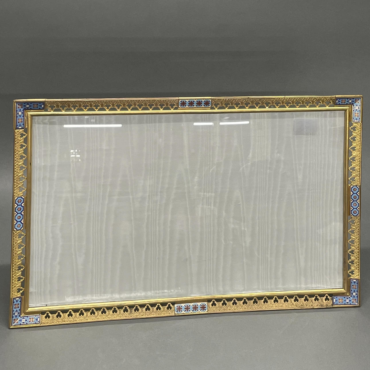 EARLY 20THC CHAMPLEVE FRAME.