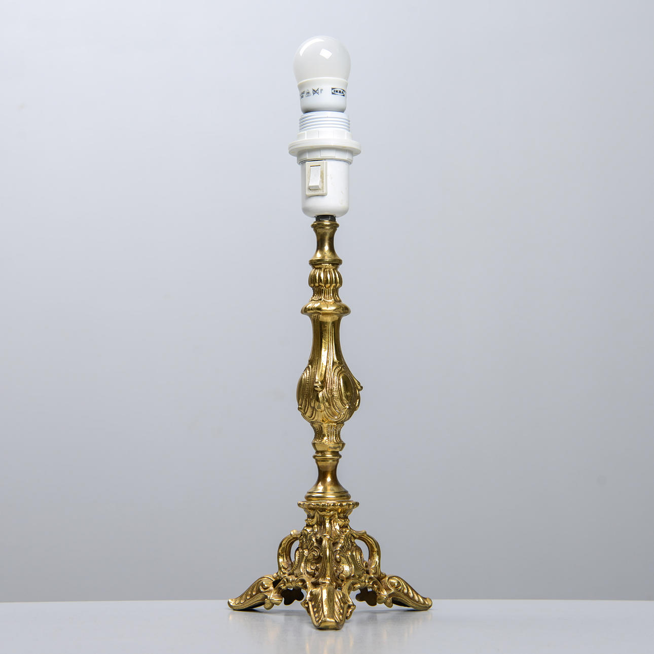 A 20th century brass table lamp, Rococo style.