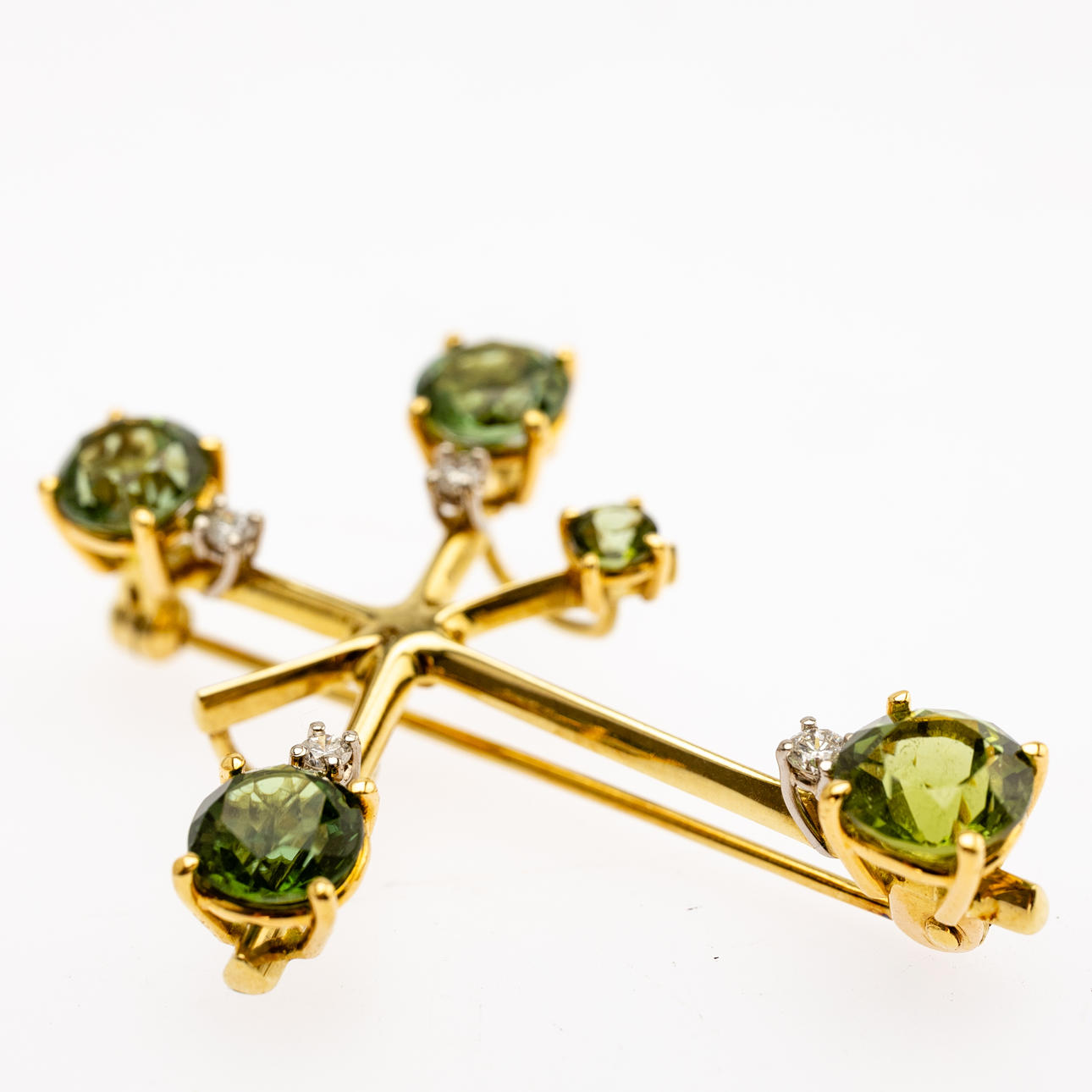 Wearable tourmaline pendant brooch.
