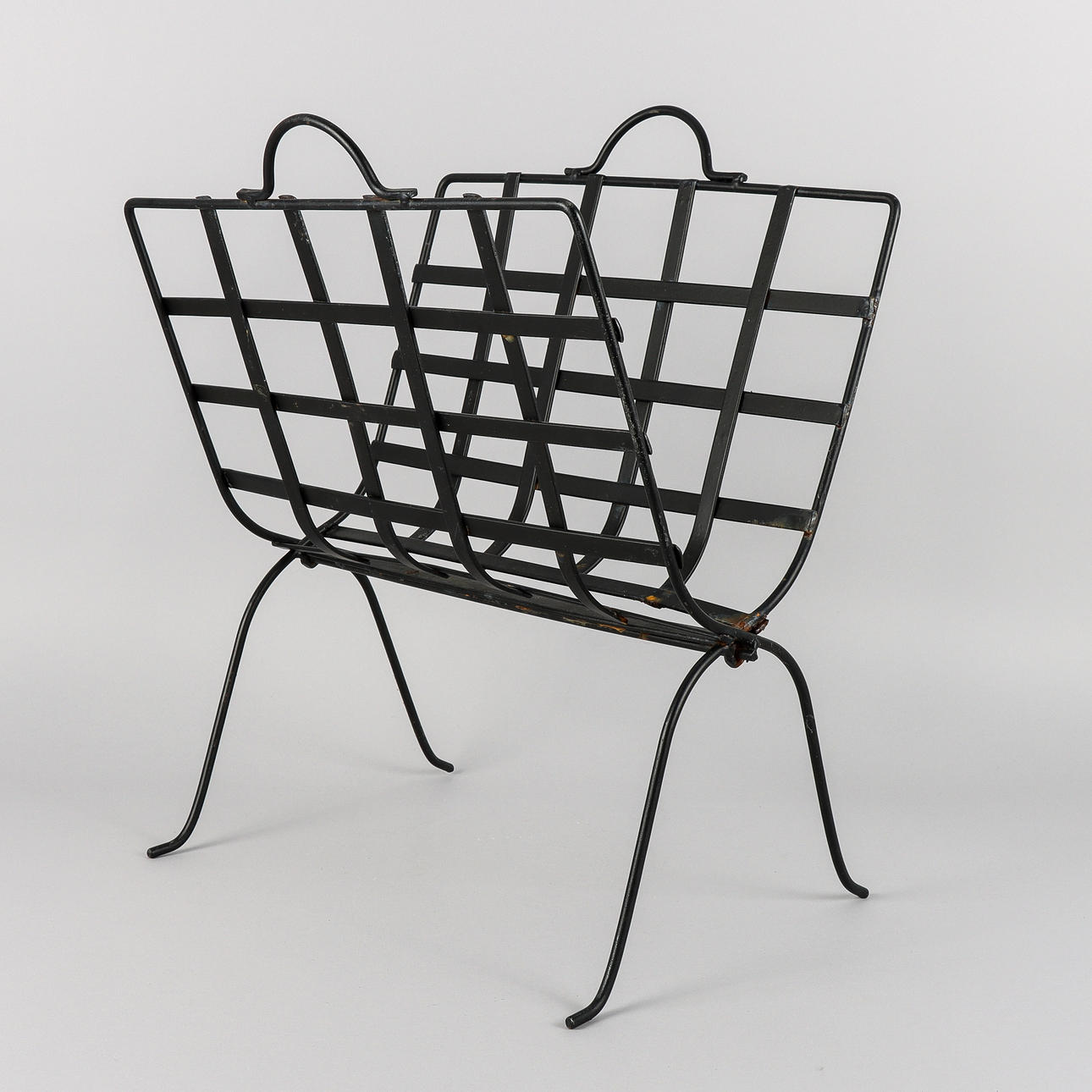A metal magazine rack, 20th century. Silver & Metals - Other metals ...