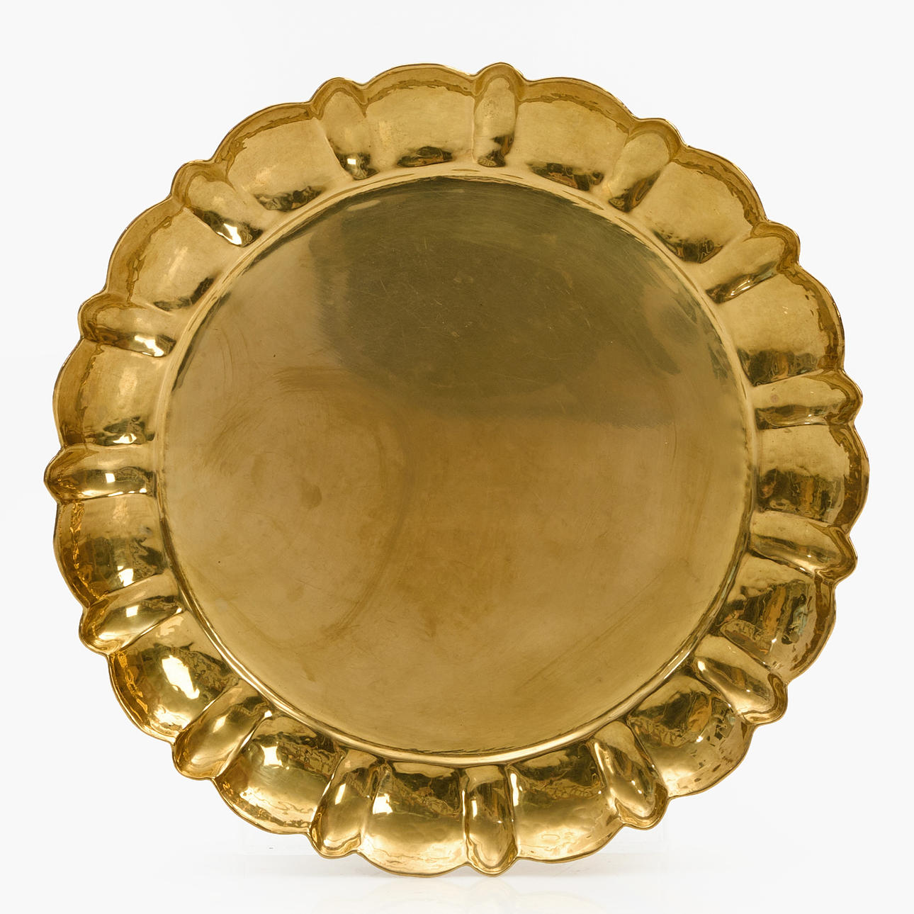 A tray, round shape, brass, by the blacksmith Yngve Svensson for Firma Lars Holmström, Arvika.