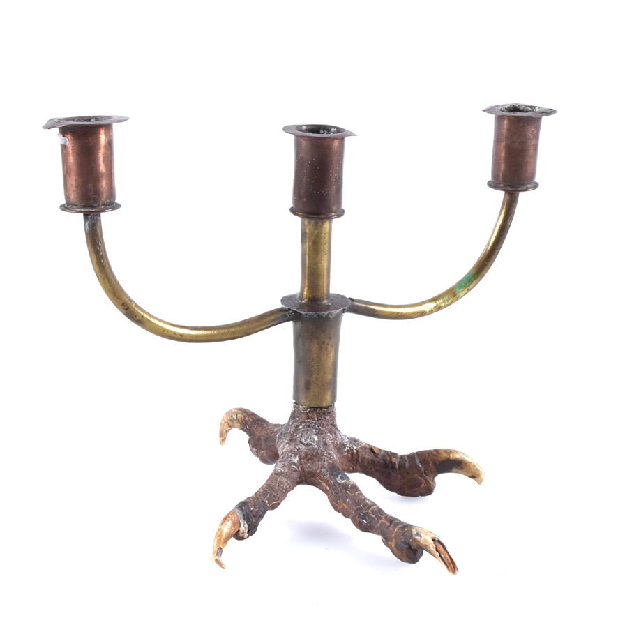 A partly brass candlestick, 20th century.