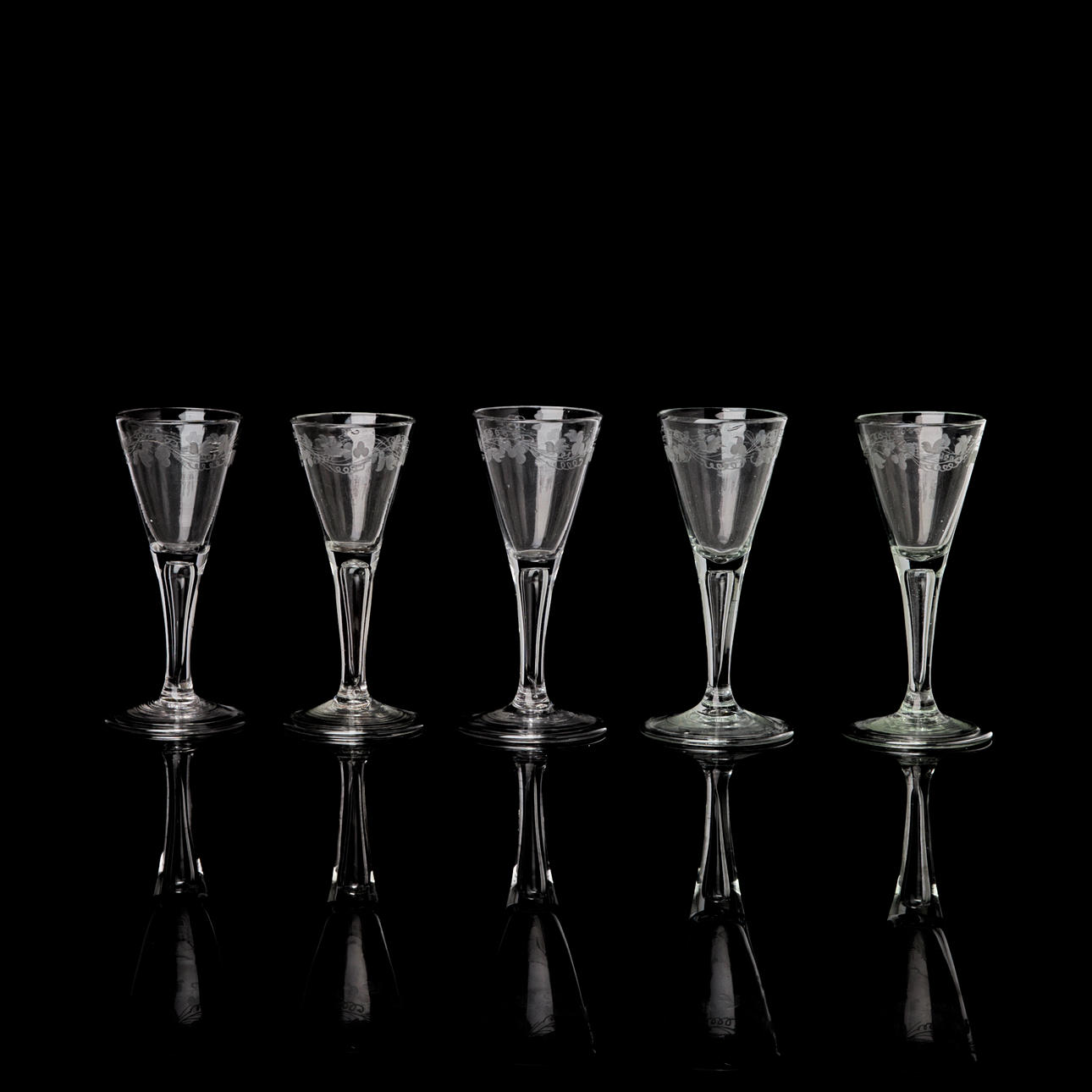 A set of five 19th century snapsglas with engraved decor.