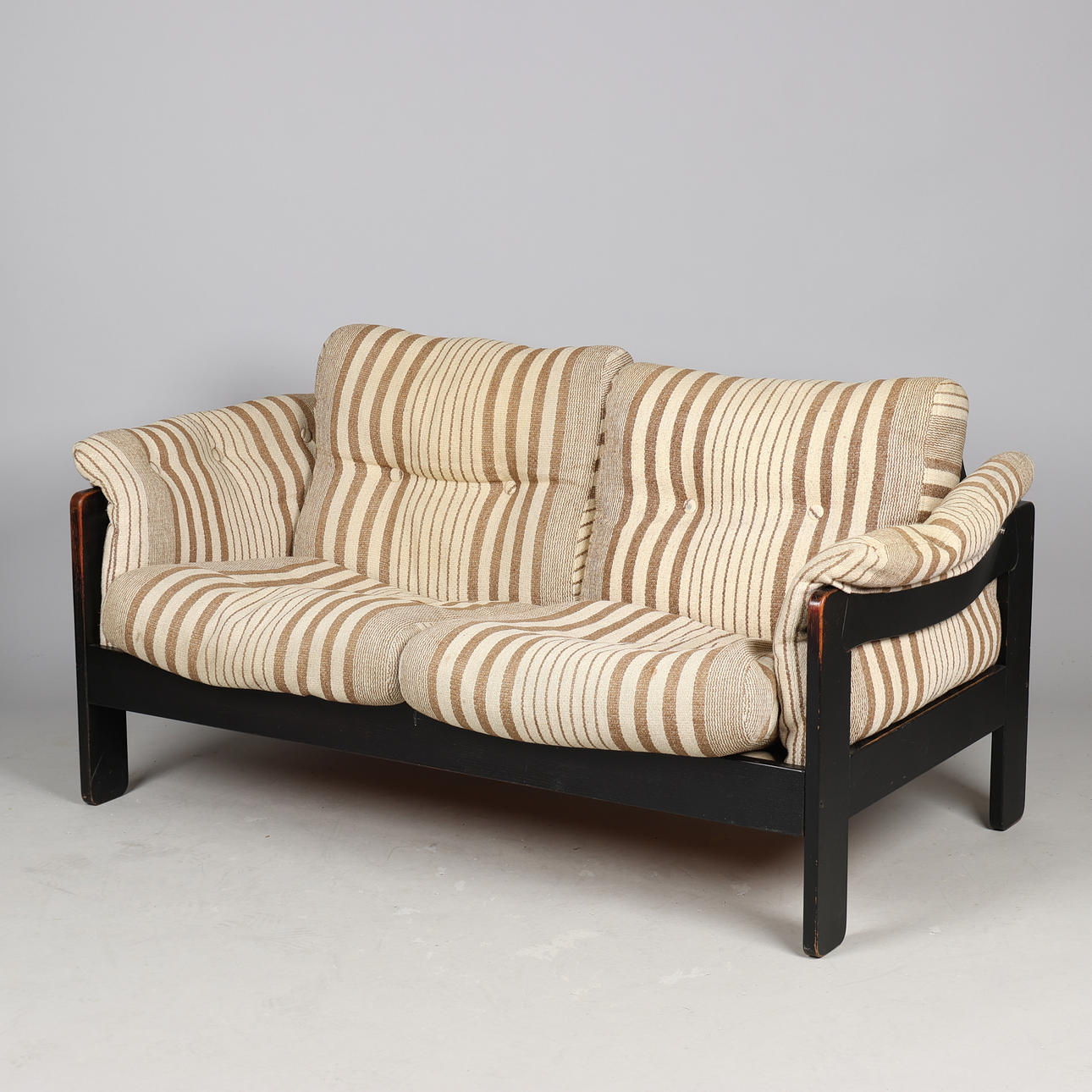 Andreas Hansen, 2-seater sofa in black lacquered oak and striped, button-stitched upholstery, Niels Eilersen, Denmark, 1970s.