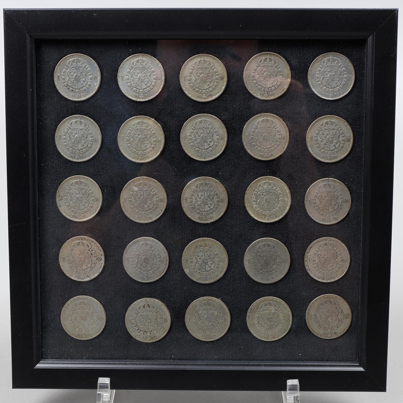 Sølvmønter, 25 stk. 1943, indrammet.