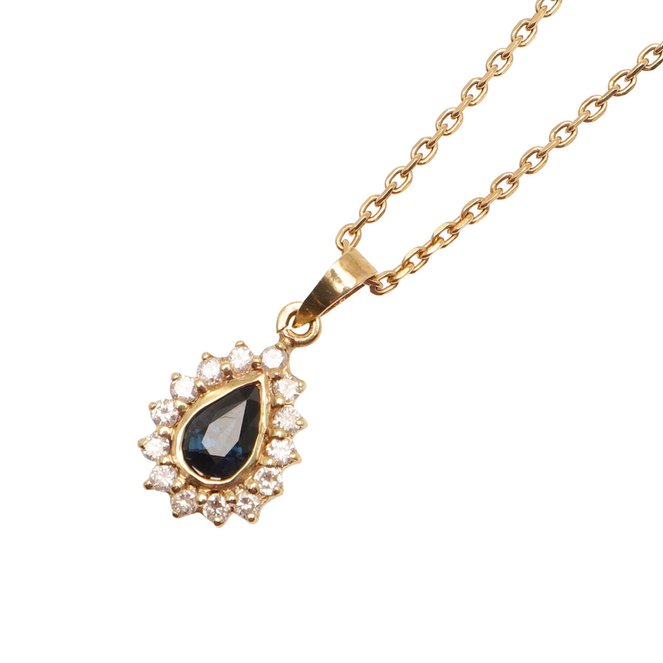 A SAPPHIRE AND DIAMOND PEAR-SHAPED PENDANT.