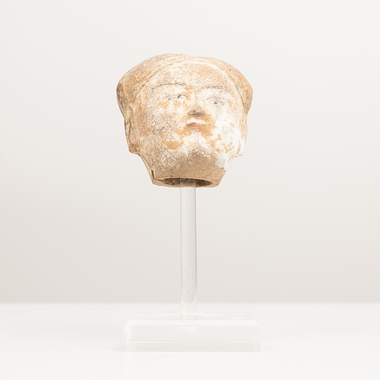 SCULPTURE/FRAGMENT, in the shape of a head, earthenware China.