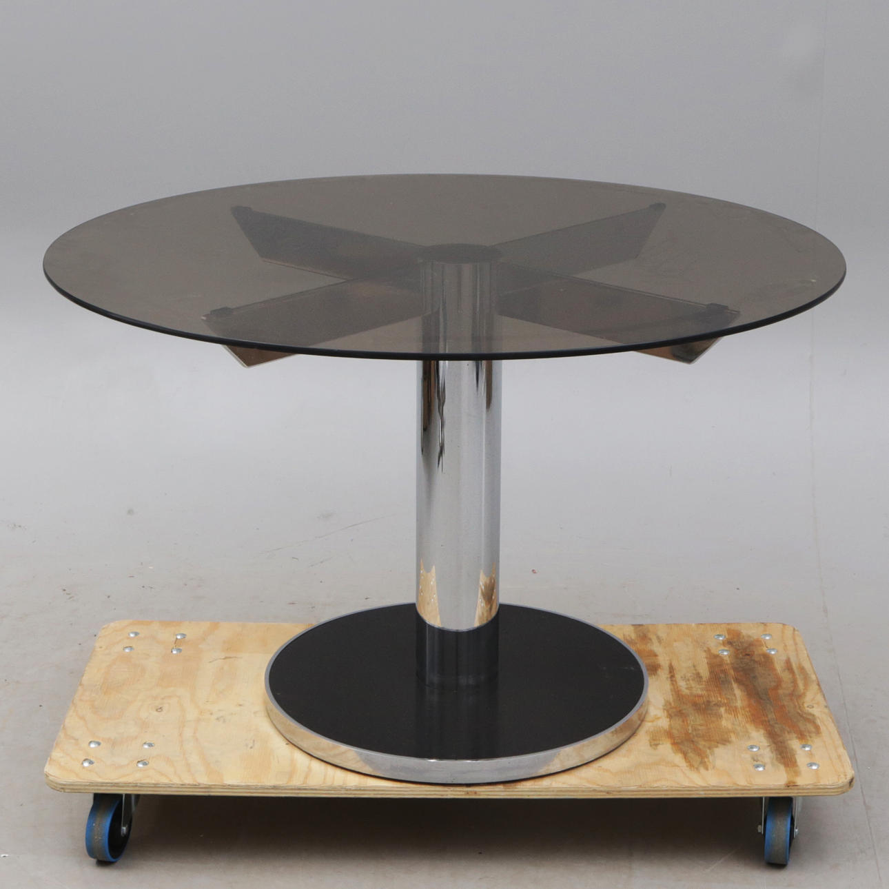 DINING TABLE, smoke-stained glass top, probably Italy.