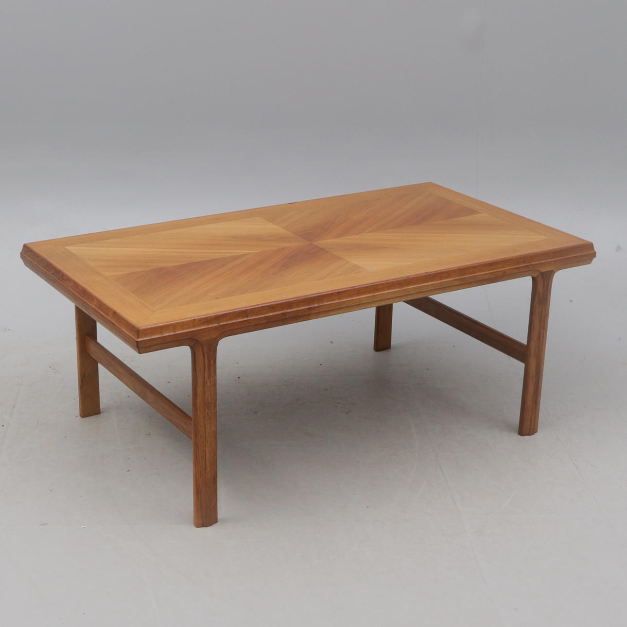 A walnut coffee table, 1960s/70s.