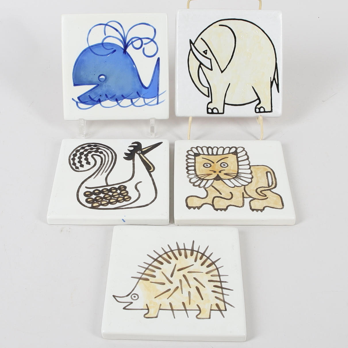STIG CARLSSON. Five porcelain tiles with animal motifs, IFÖ, Bromölla, second half of the 20th century.