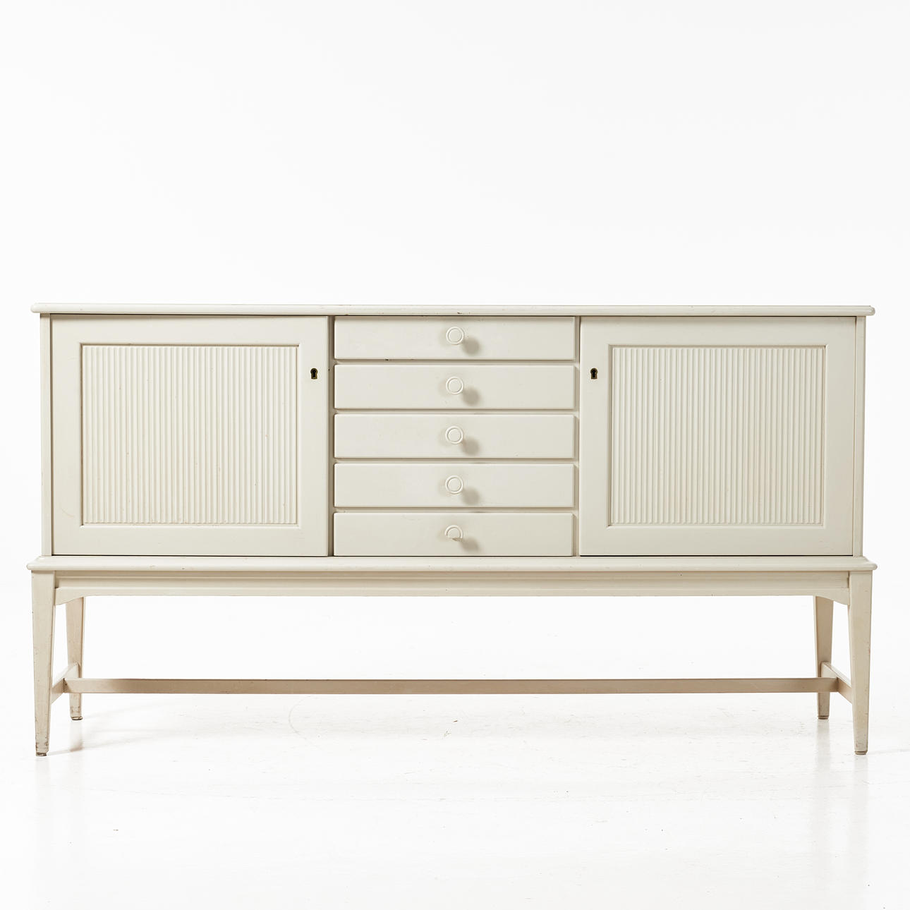 SVANTE SKOGH. sideboard, Gustavian style, 5 drawers in sarg, doors with back shelves, second half of the 20th century.