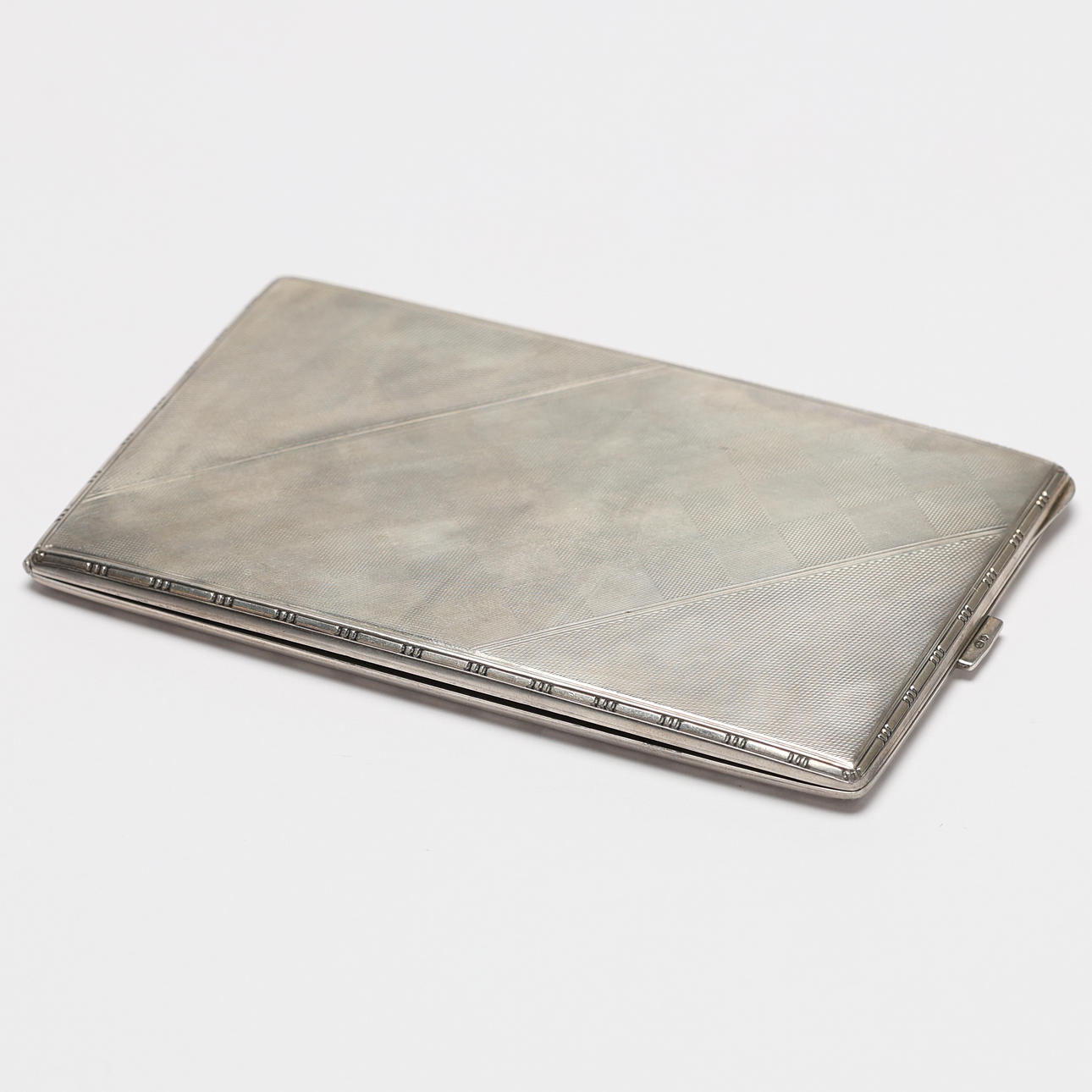 CIGARETTE BOX. Silver, engraved inside.