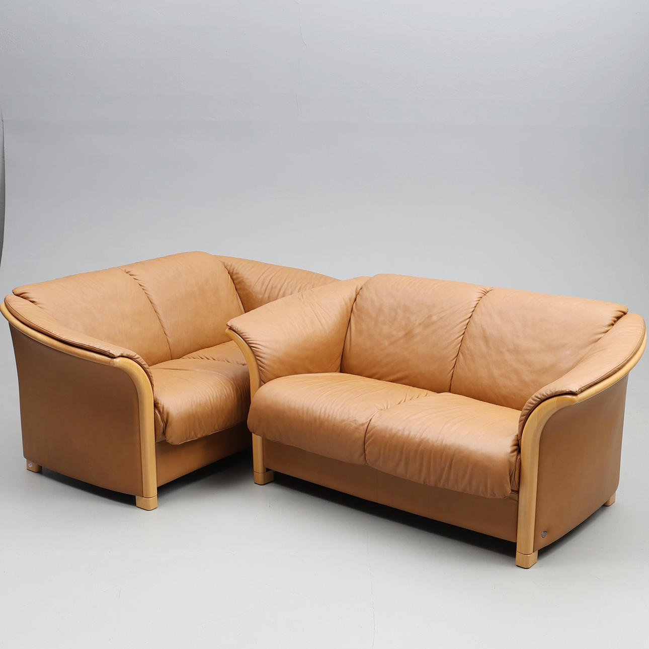 A pair of leather sofas, “Ekornes Collection”.
