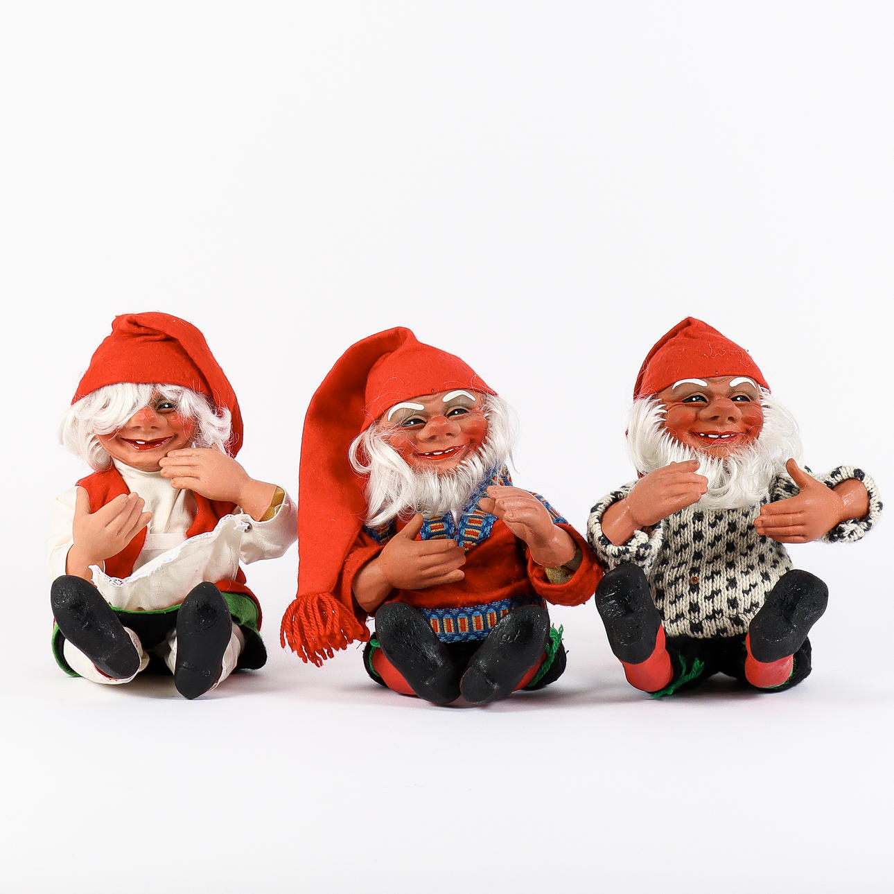 ARNE HASLE. Three latex gnomes, Askim, Norway.