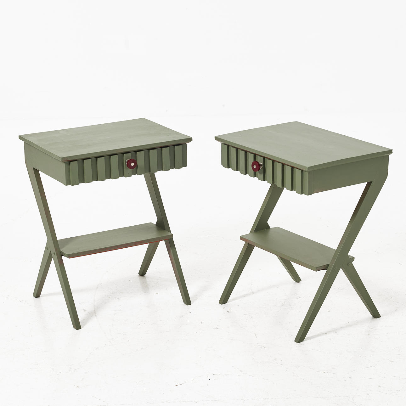 A pair of 1940s/50s bedside tables, painted. With drawer and shelf.