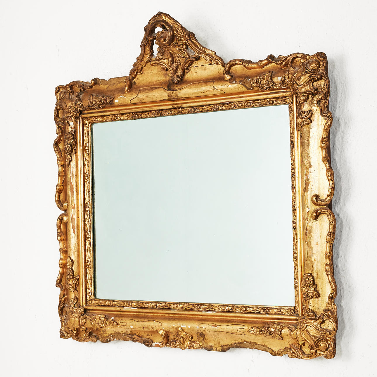A Neo-Rococo, bronzed mirror, last quarter of the 19th century.