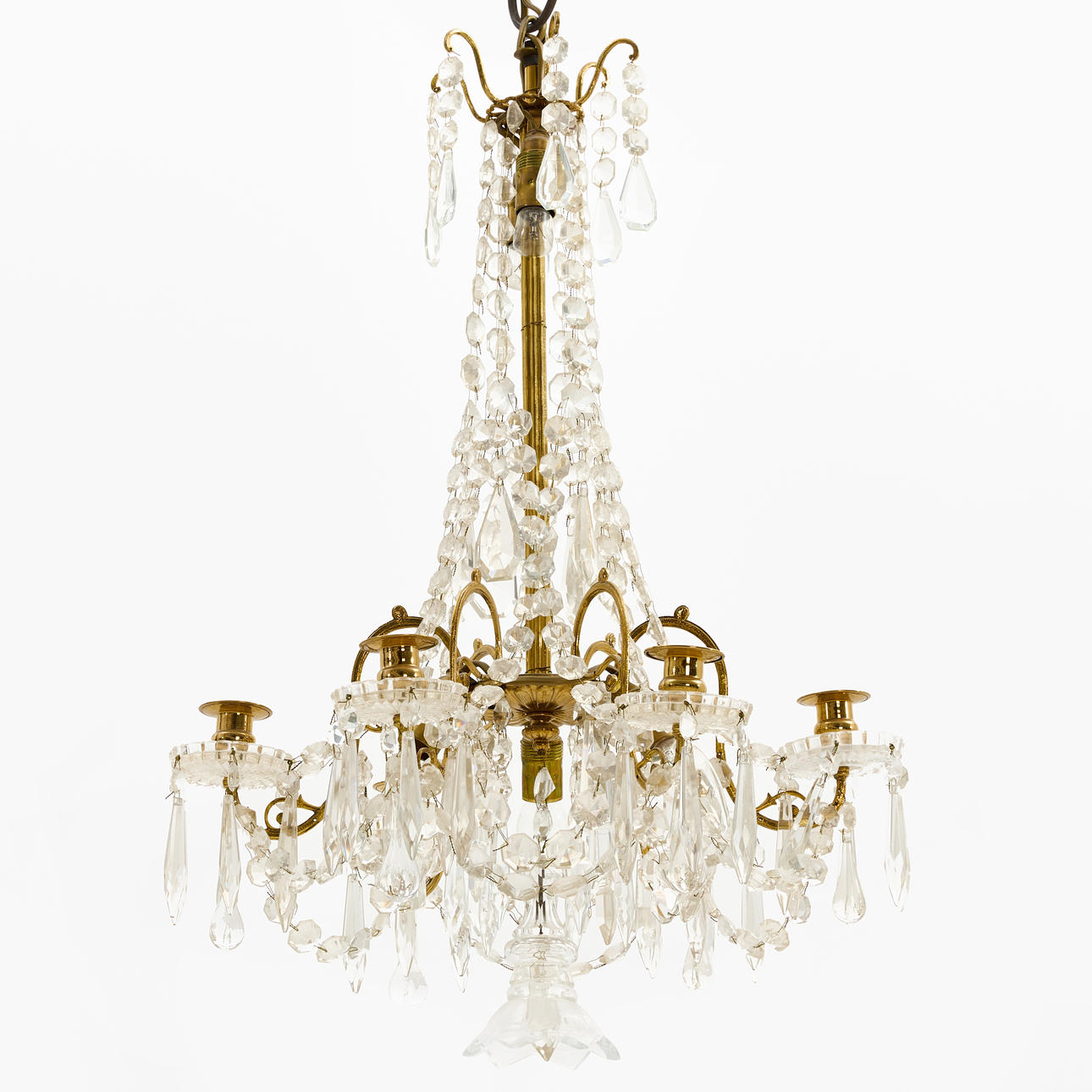 A chandelier, around the turn of the century 1900, differently shaped prisms, 6 light arms.