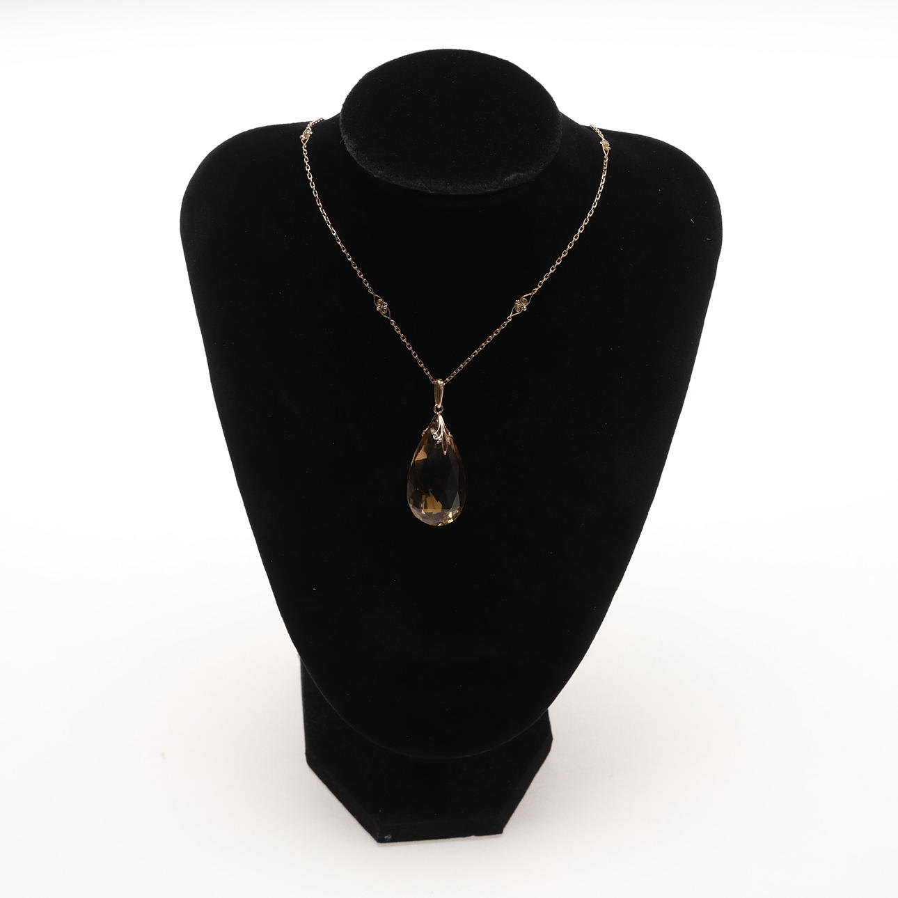 NECKLACES. 18K gold, smoky quartz.