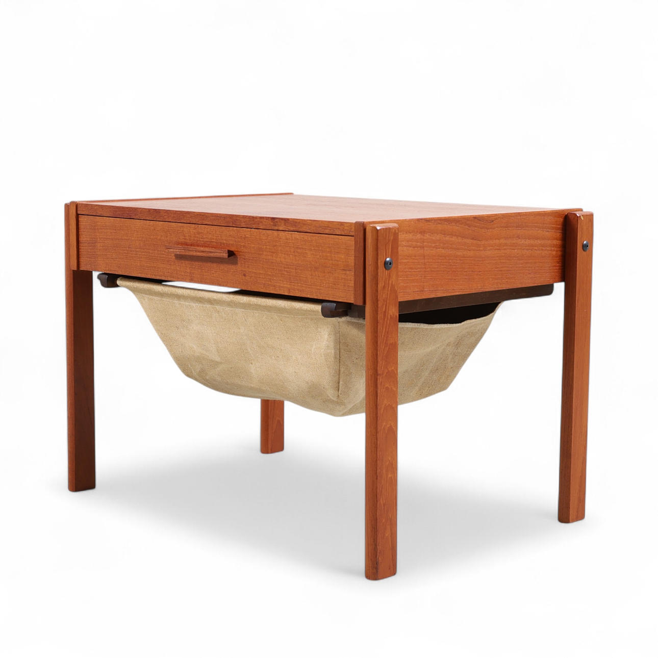 A teak & canvas sewing table, 20th century.