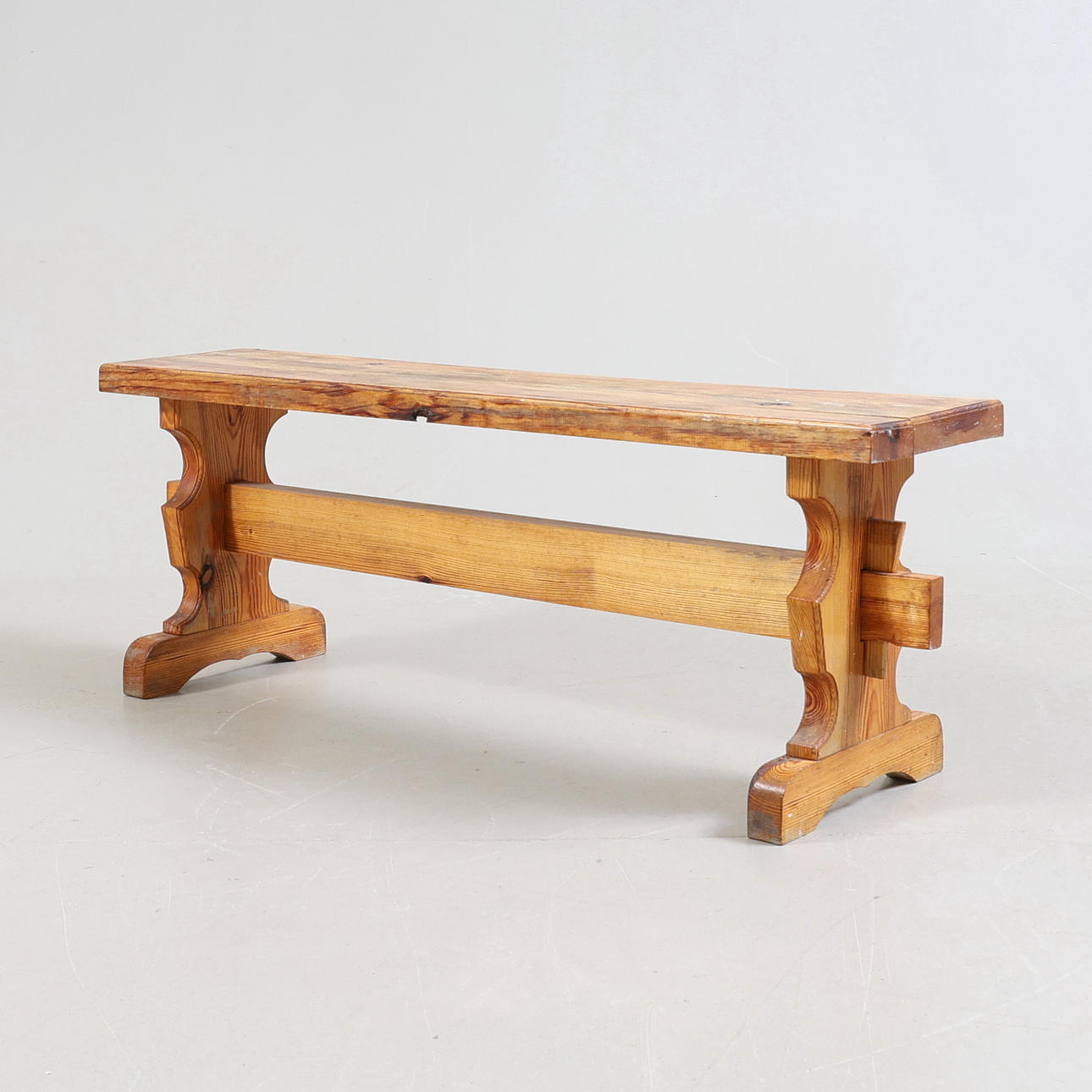 A 20th century pine bench.