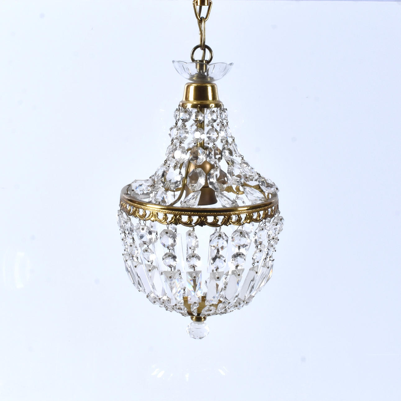 A 20th century ceiling lamp with prisms.