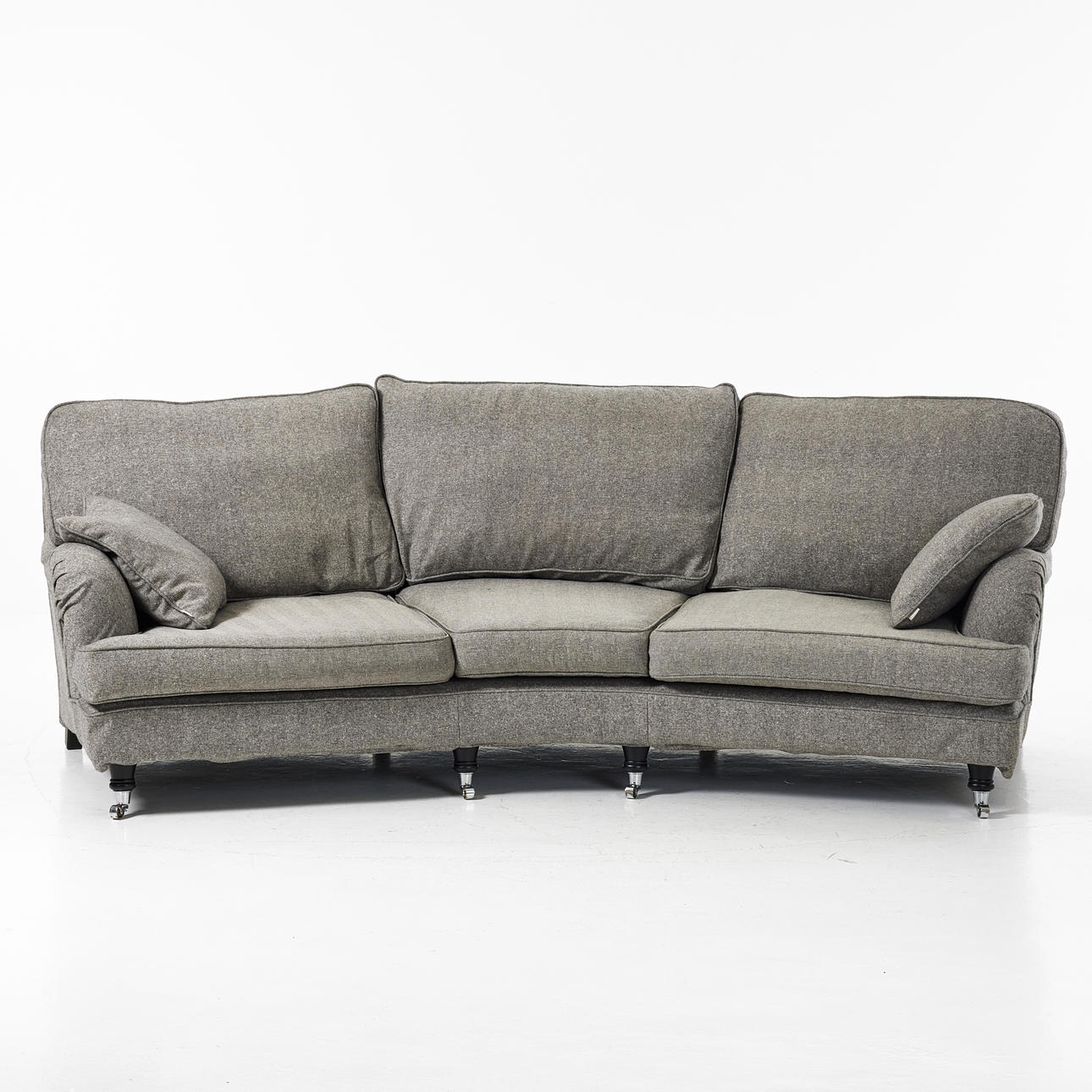 ENGLESSON, Howard sofa with curved seat, upholstered in herringbone patterned fabric, removable upholstery, brass cardigans.