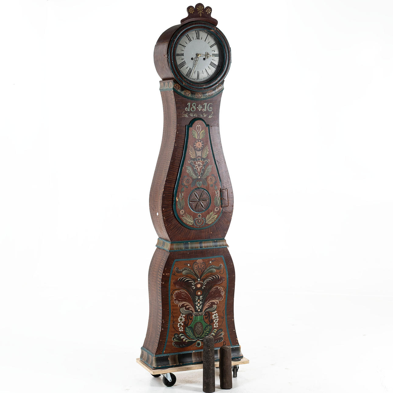 A floor clock, a so-called morac clock, dated 1816.