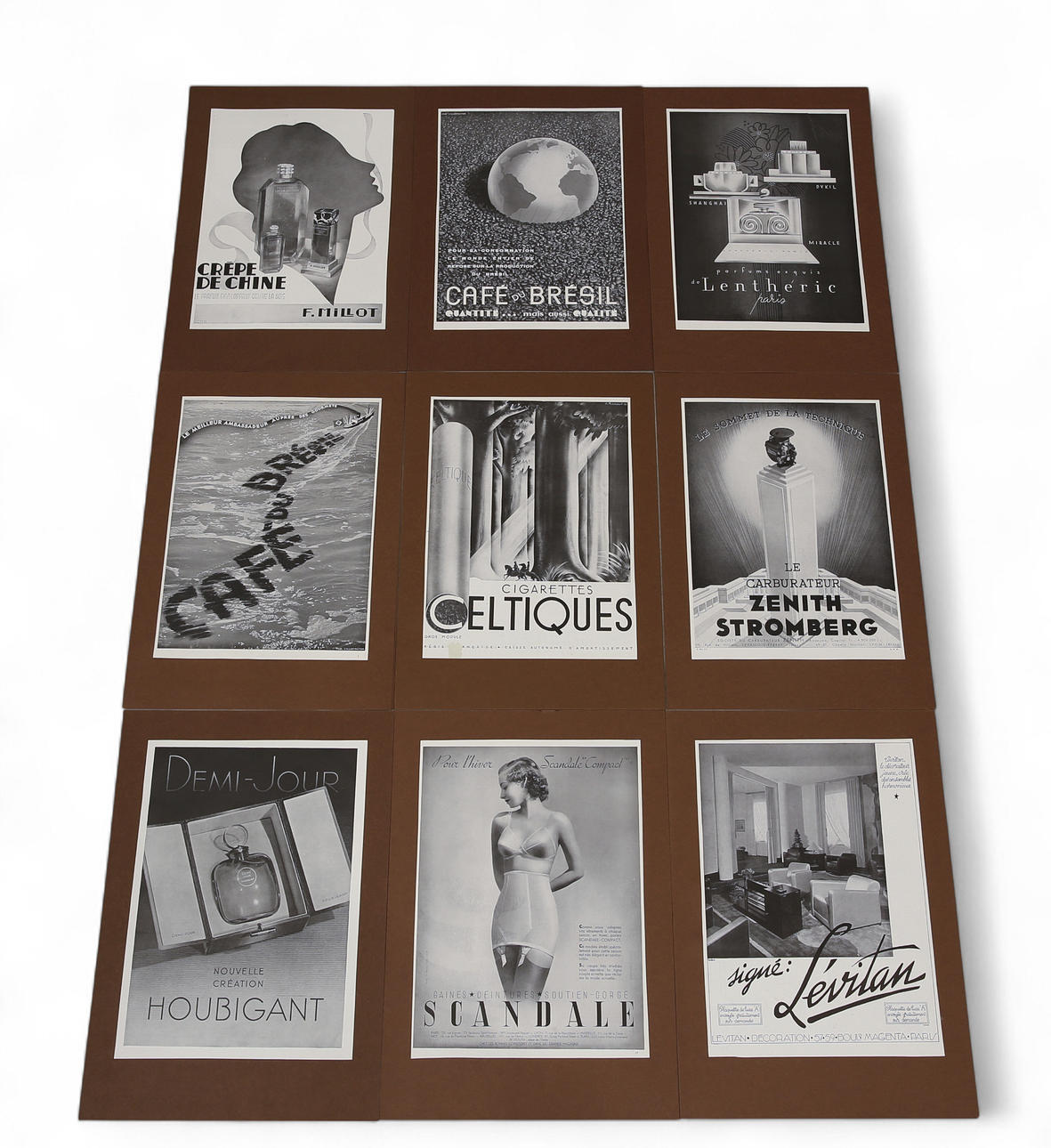 NEWSPAPER CLIPS inserted in brown passepartout depicting advertisements for various perfumes, coffee, underwear etc., 9 pieces.